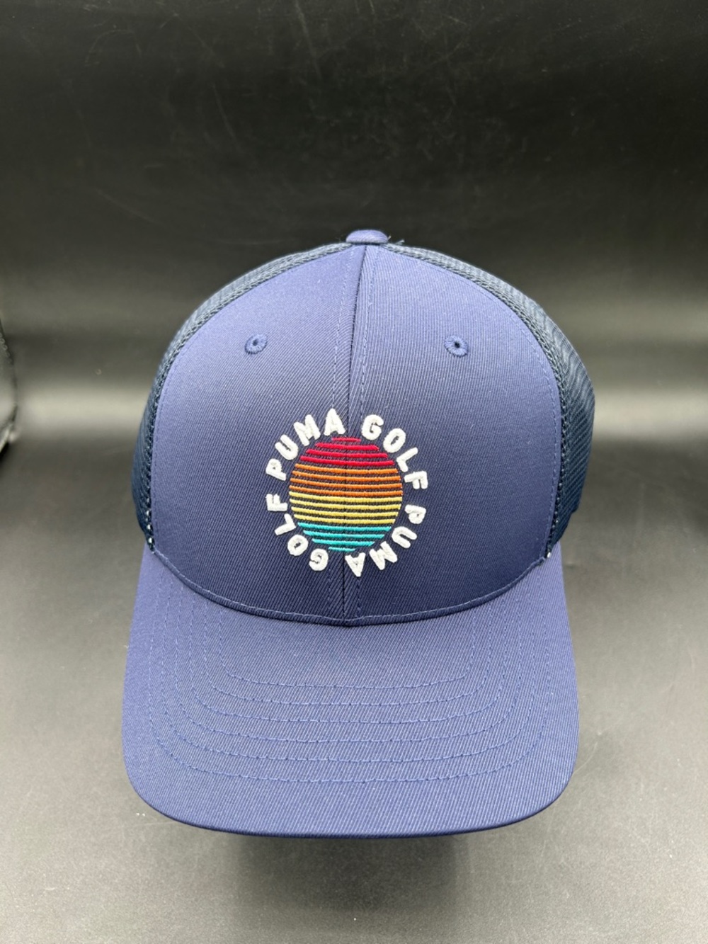 Puma Navy Trucker Hat with Rainbow Striped Sun Patch